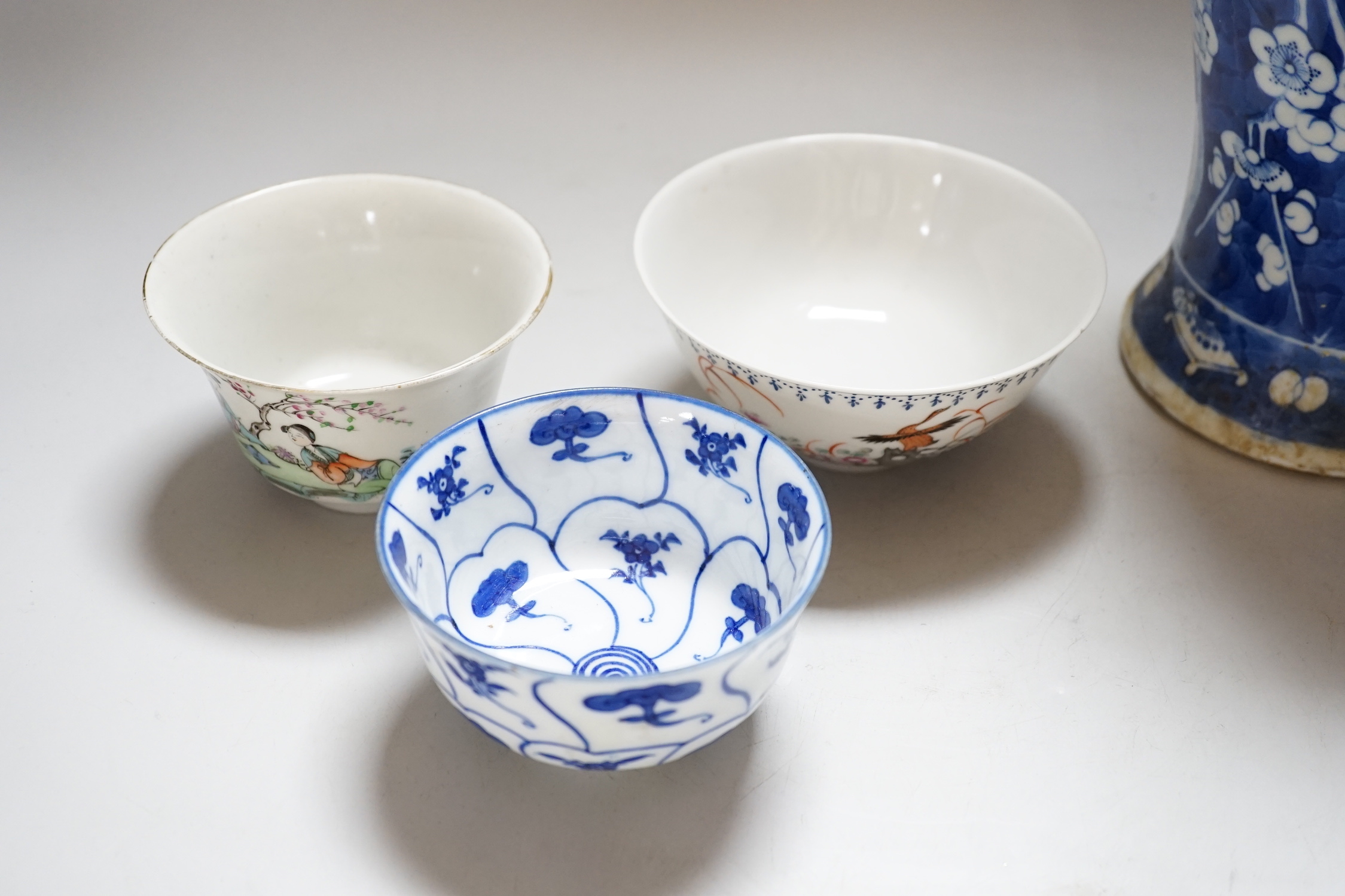 A Chinese prunus vase, a smaller vase and three rice bowls, prunus vase 30cm high